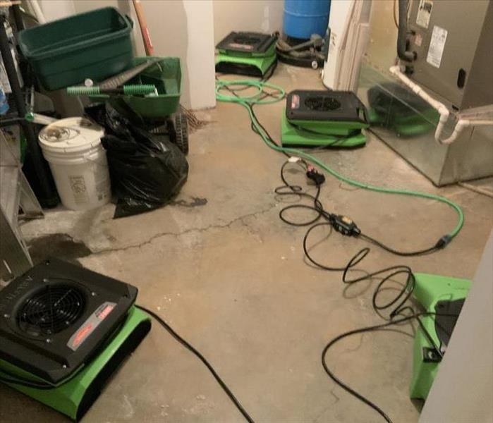 SERVPRO drying equipment working hard to dry a Category 2 water job.
